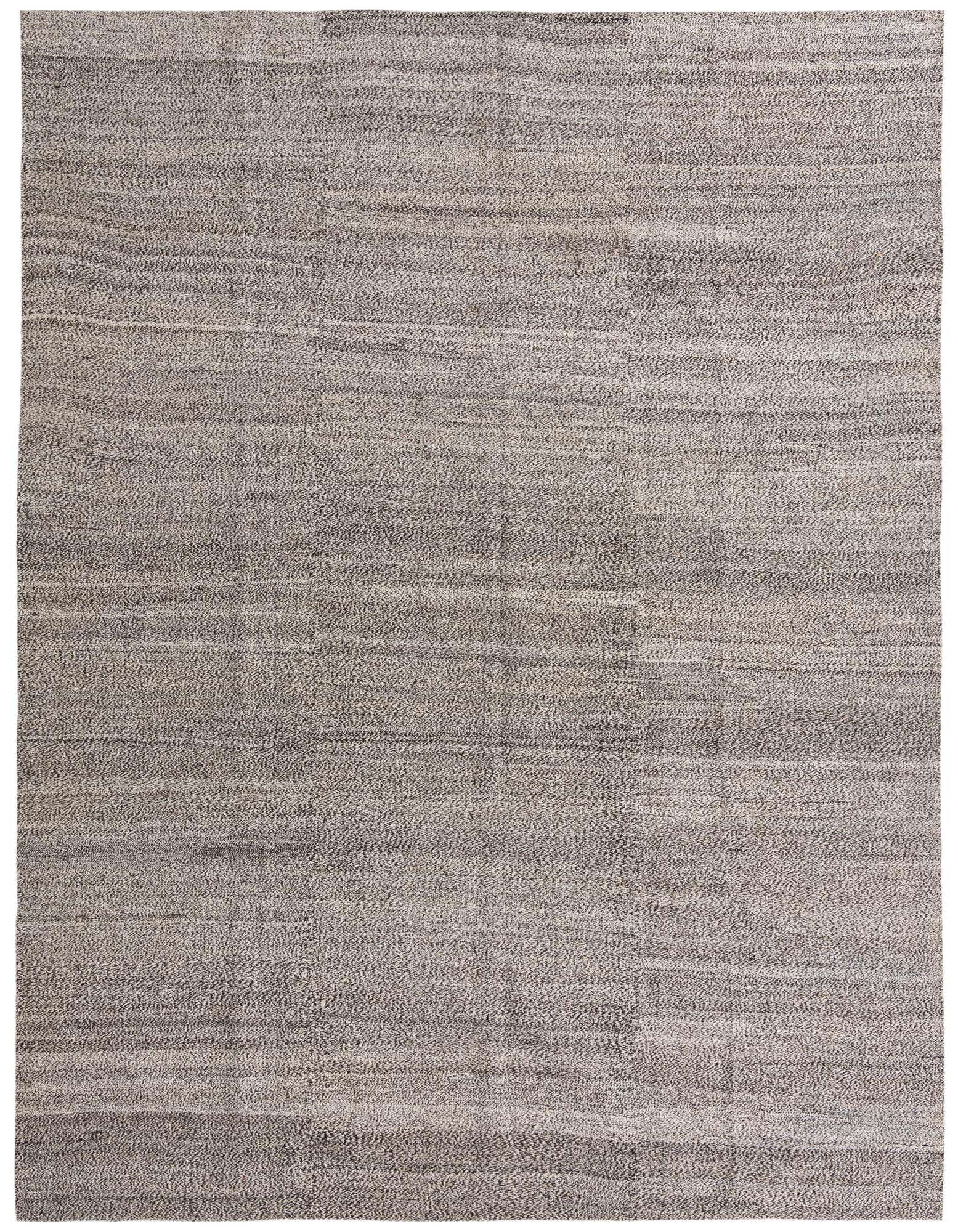 A 9x11 rectangular Kilim Modern wool rug featuring an abstract tribal pattern in black and ivory tones, ideal for indoor spaces.