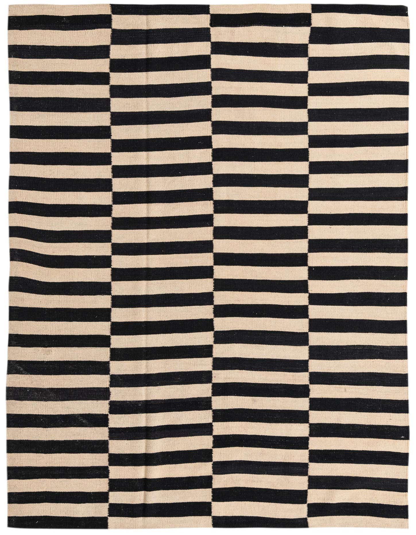 A 5x8 rectangular Kilim Modern rug with a bold black and ivory striped pattern, suitable for a living room.
