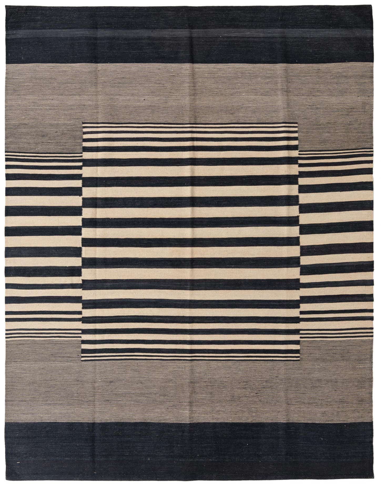 A 7x10 rectangular flatweave rug with a modern tribal stripe pattern in black and ivory, suitable for a living room.