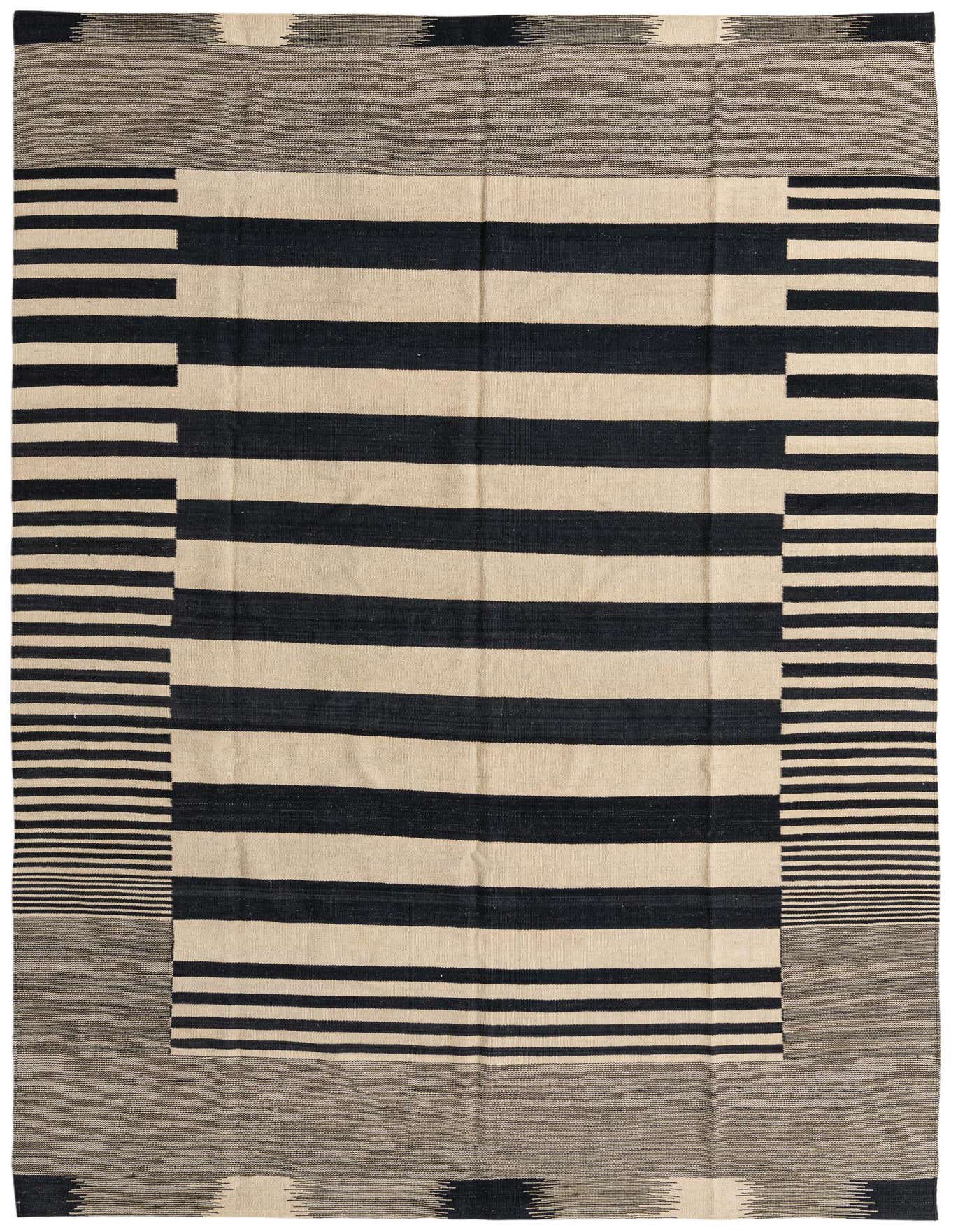 A 7x10 rectangular flatweave rug featuring bold black and cream horizontal stripes, framed by a gray and black tribal border.