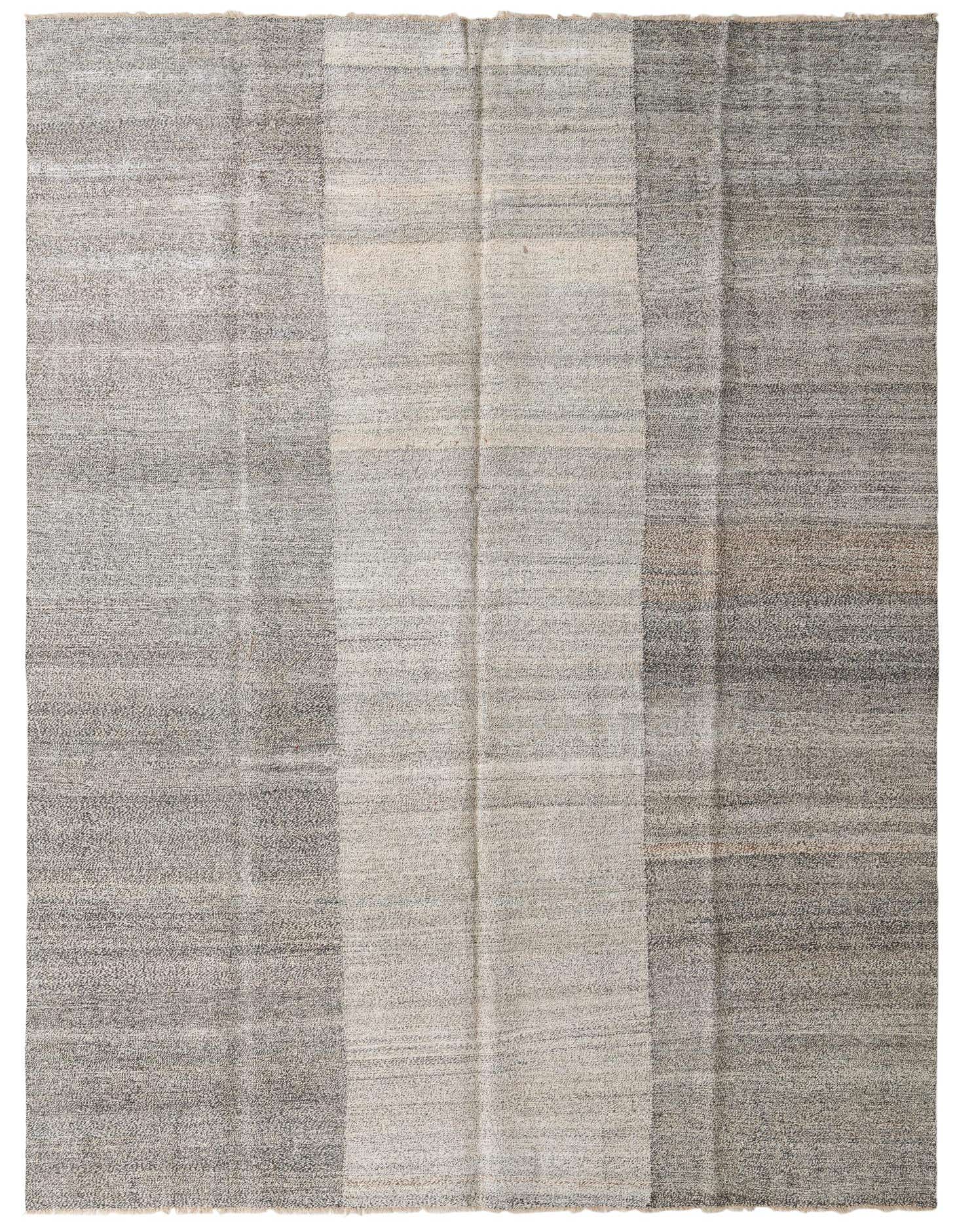 A 9x12 rectangular Kilim Modern rug featuring abstract tribal stripes in varying shades of black, white, and cream.