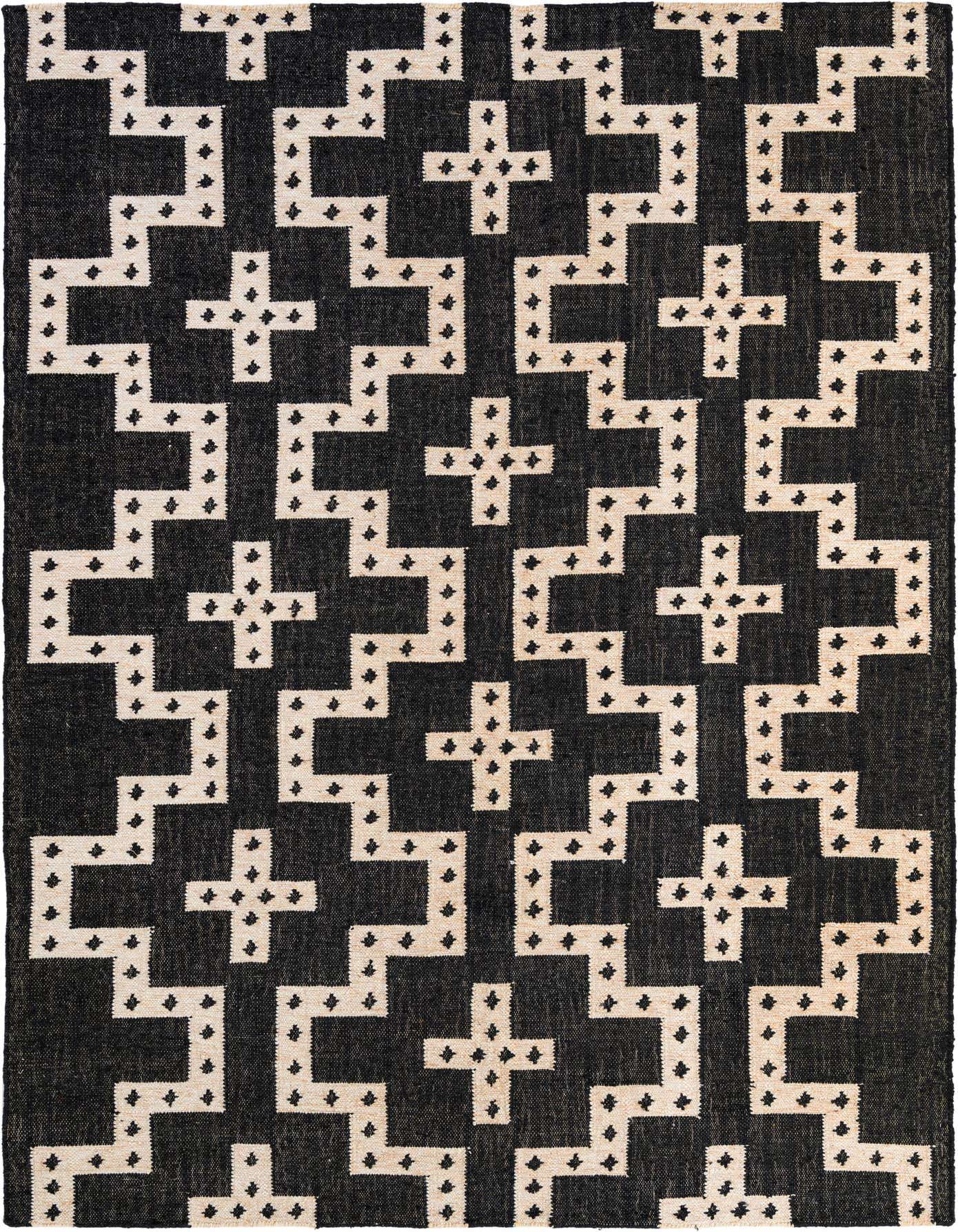 A 6x9 rectangular Kilim Wool rug featuring a bold black and ivory tribal geometric pattern, perfect for a modern living room.