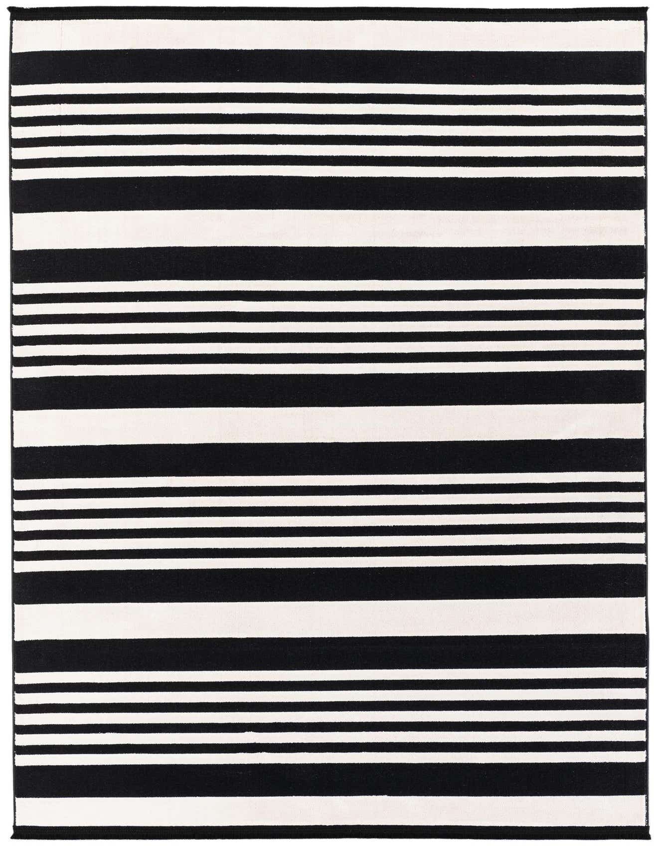 A 5x8 rectangular black and white striped modern area rug with varying stripe widths.