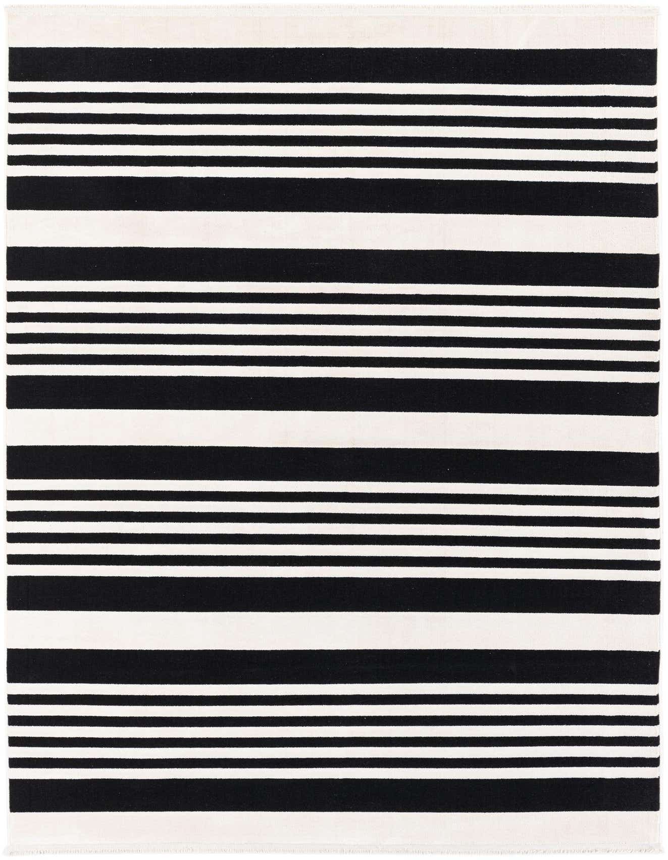 A 5x8 rectangular black and white striped area rug with varying stripe widths, suitable for a modern living room.