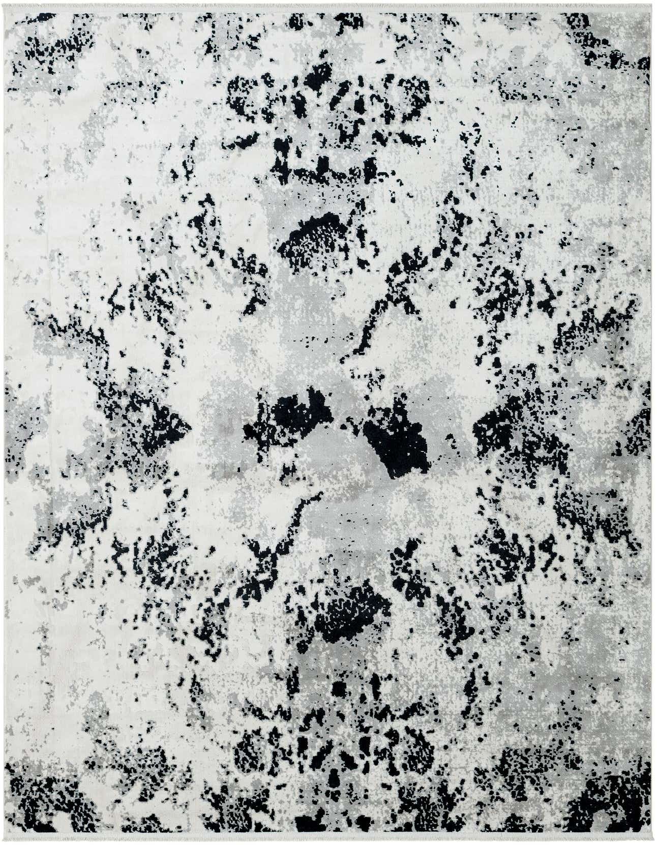 A 6x9 rectangular Rugs.com Milano area rug featuring a modern abstract pattern in black, white, and ivory.