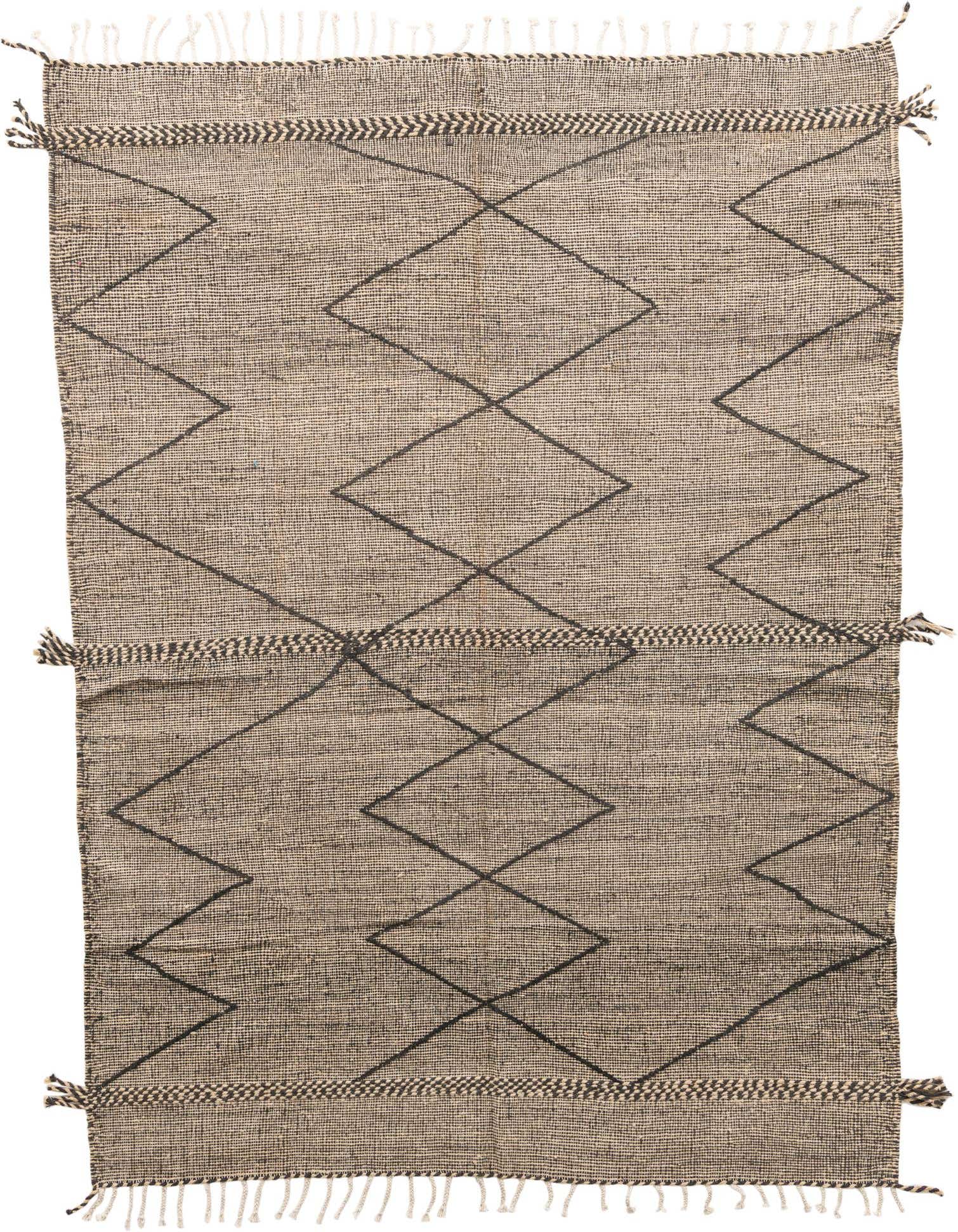 A 7x10 rectangular black and ivory tribal wool shag rug with a diamond pattern and fringe.