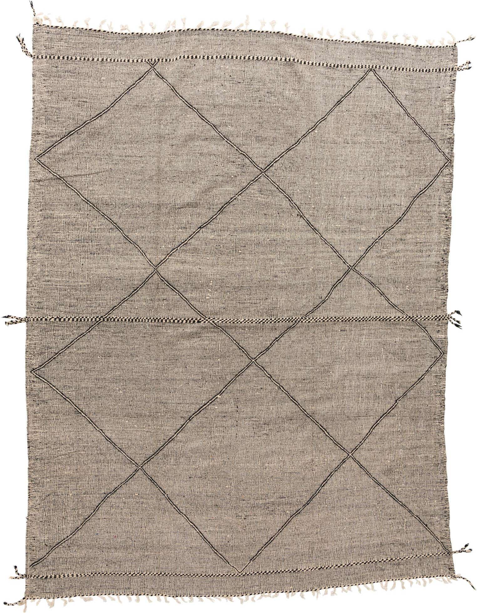 A 10x13 rectangular black and white tribal wool shag rug with a modern geometric diamond pattern.