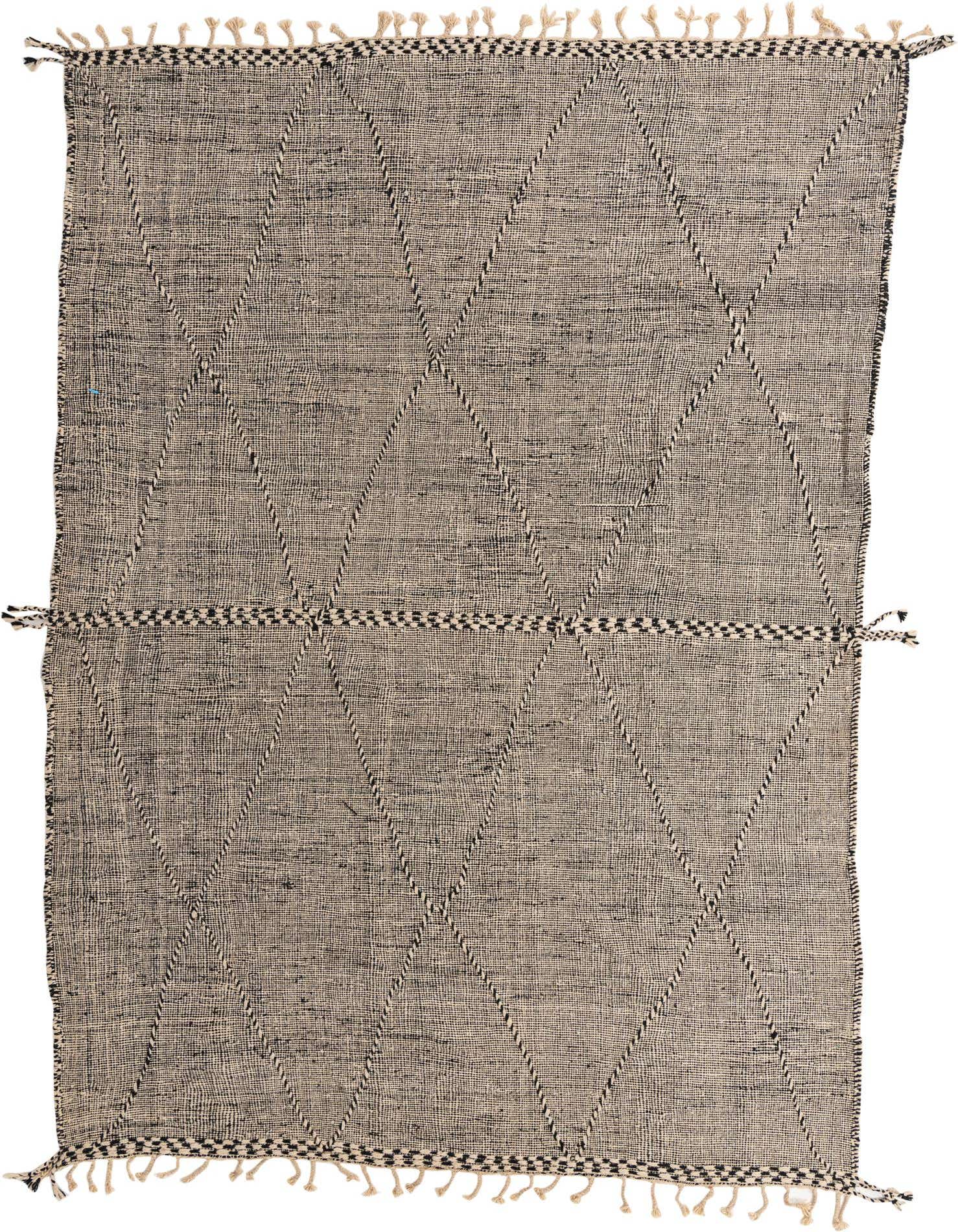 A 9x12 rectangular black and ivory tribal wool shag rug with a diamond pattern and fringe.