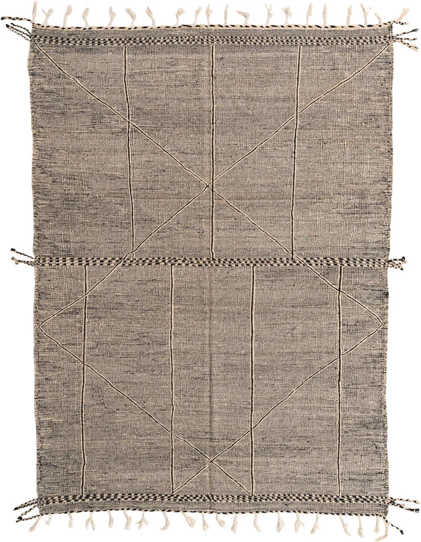 An 8x11 rectangular black and white tribal wool rug with geometric patterns and fringe, perfect for a living room.