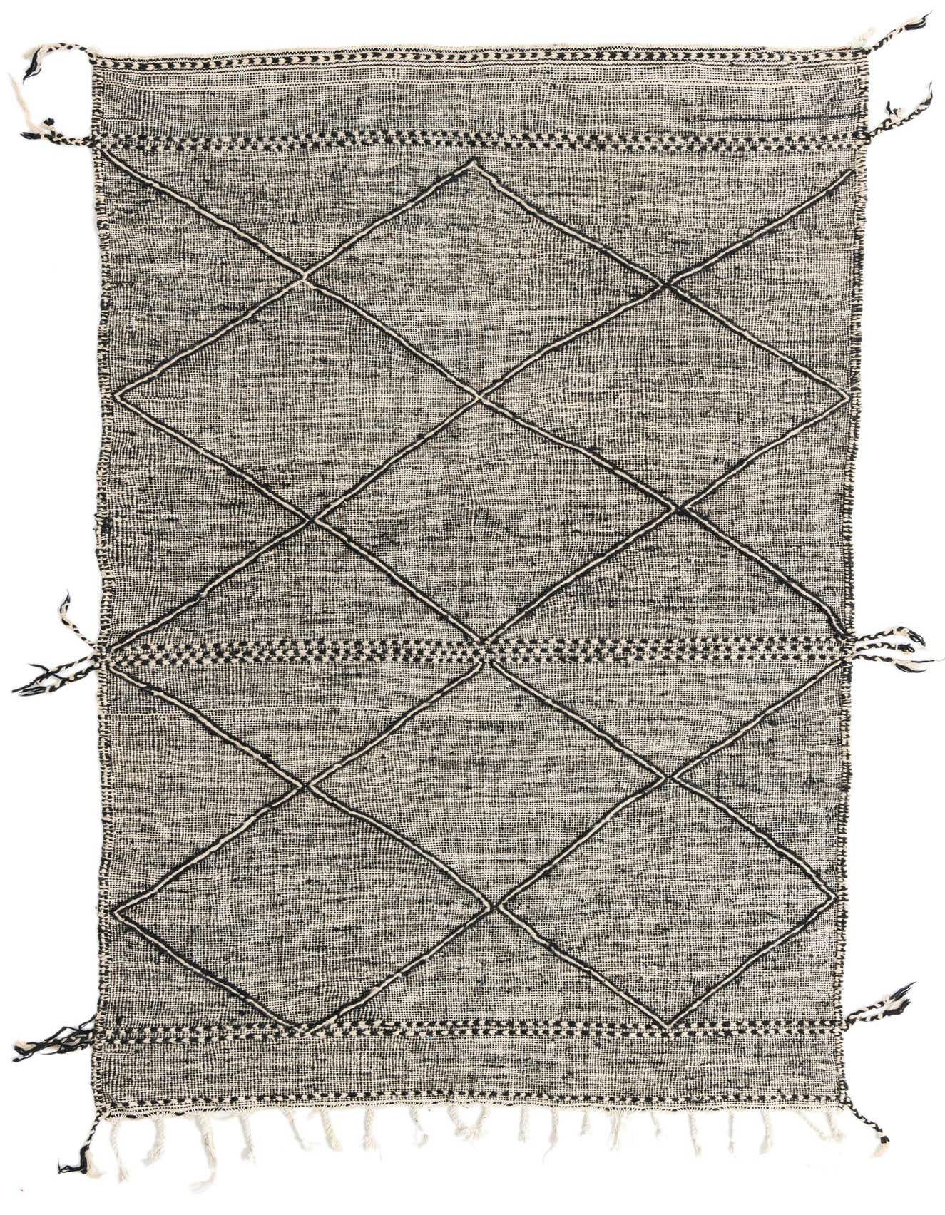 A 5x8 rectangular black and white Moroccan shag rug with a bold diamond pattern and fringe.