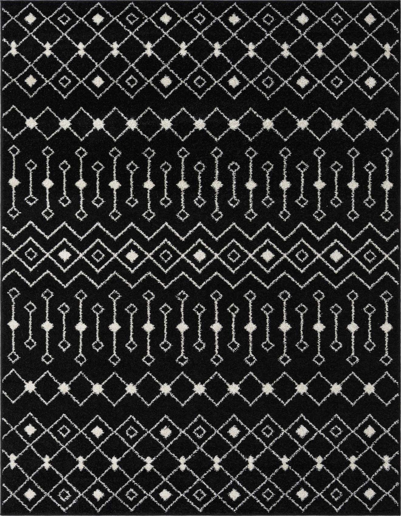 A 6x9 rectangular black and white Moroccan Trellis rug with a tribal geometric pattern, ideal for a living room.