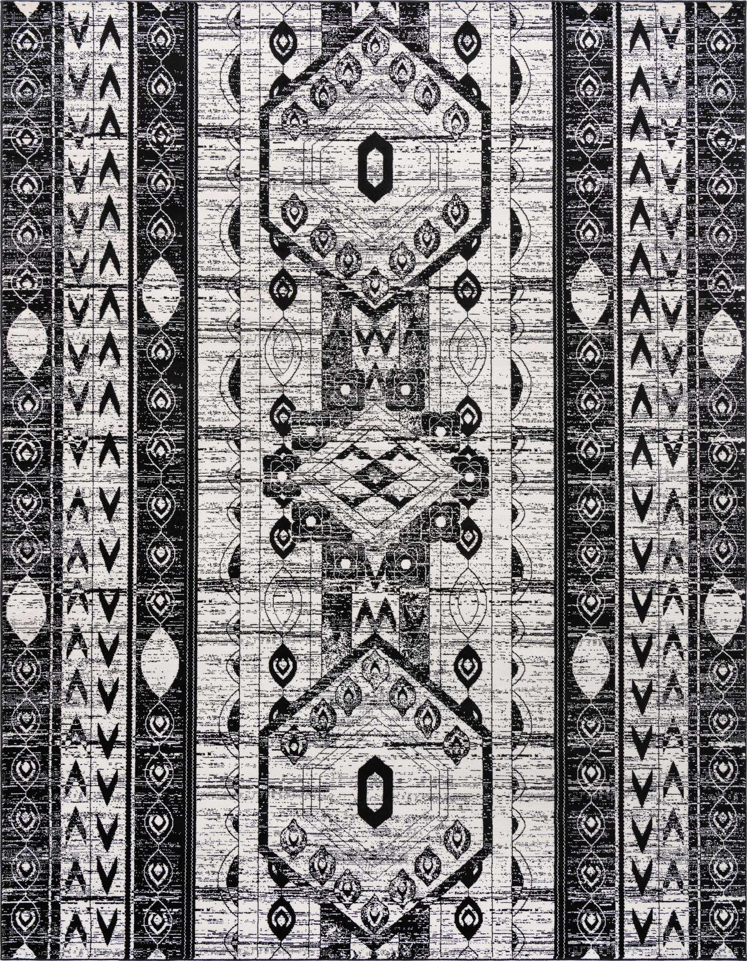 A 10x13 rectangular black and white bohemian rug with tribal and stripe patterns, featuring large central medallions and textured pile.