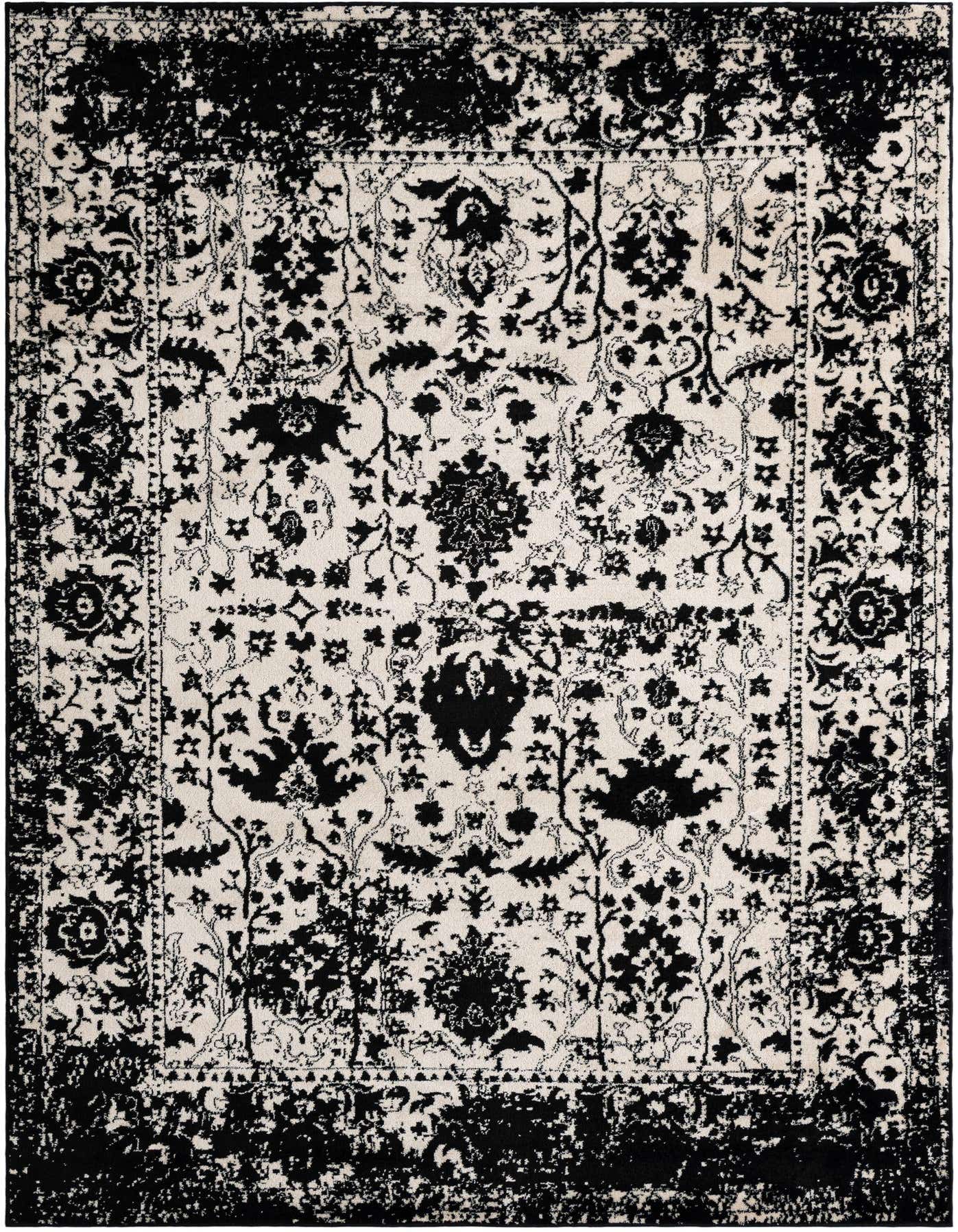 A 7x10 rectangular black and white shabby-chic rug with a distressed traditional floral pattern, ideal for a living room.