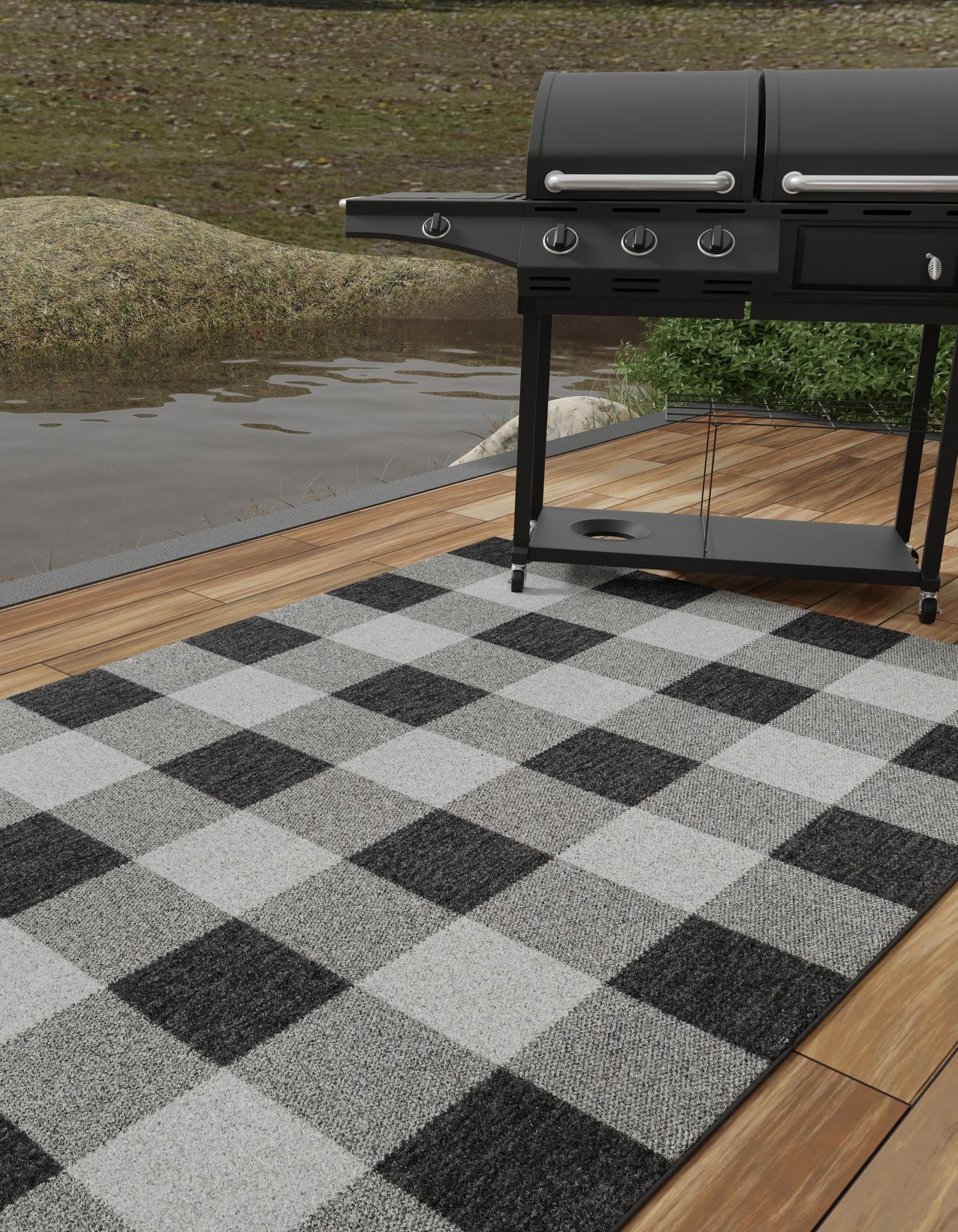 Black and White 9' x 12' Checkered Indoor / Outdoor Rug