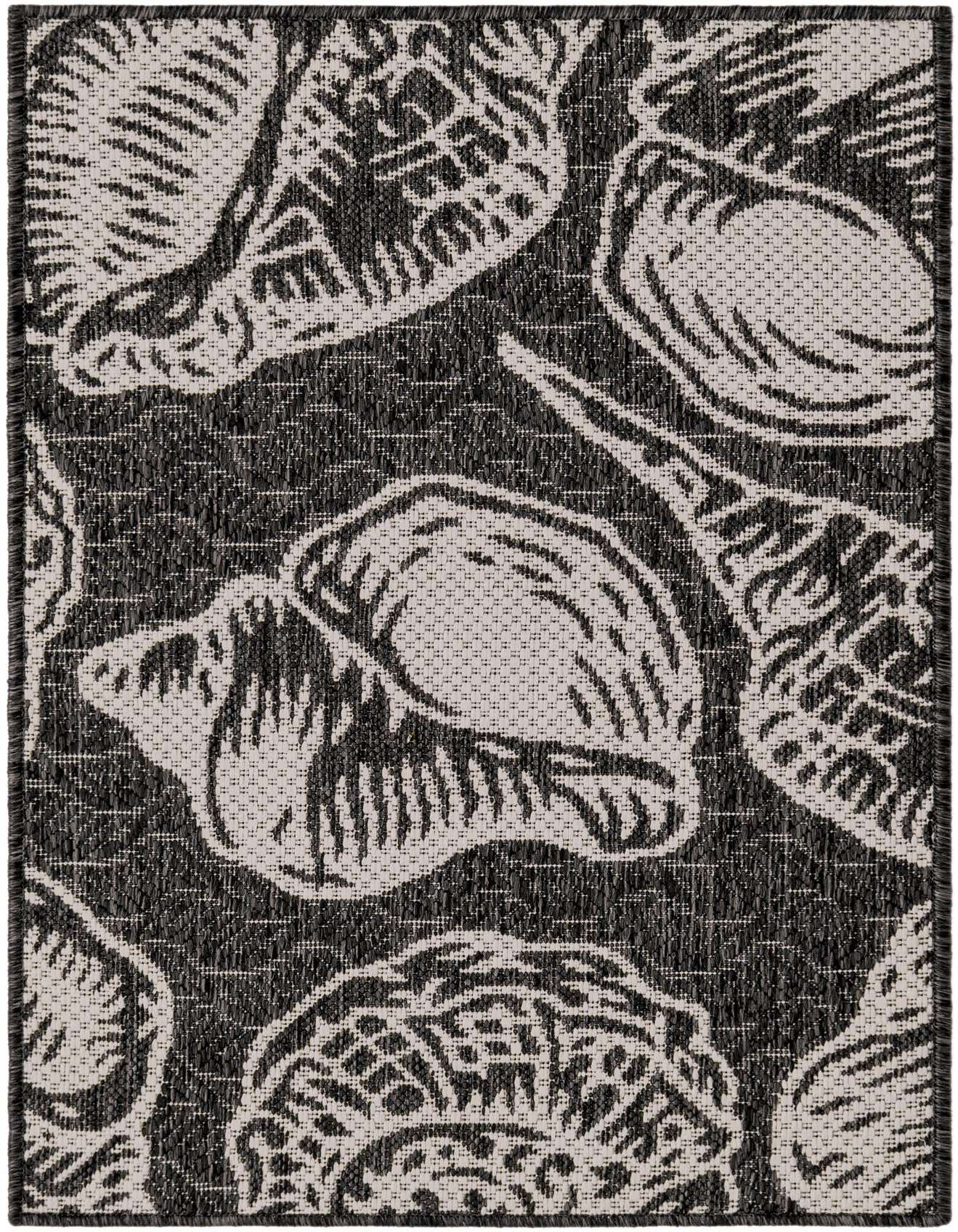 A 2x3 rectangular black and white flatweave rug with a modern coastal seashell pattern, suitable for indoor or outdoor use.
