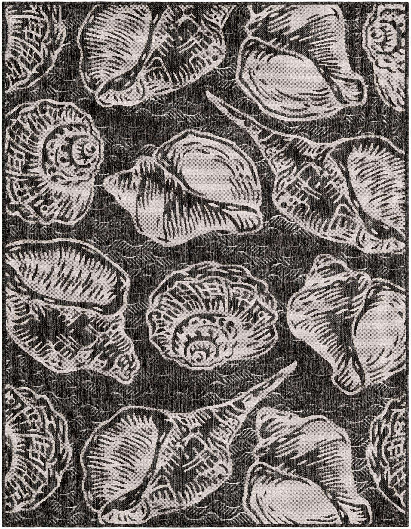 A 4x6 black and ivory rectangular indoor/outdoor rug featuring a modern coastal pattern of various seashells, perfect for a patio or living room.