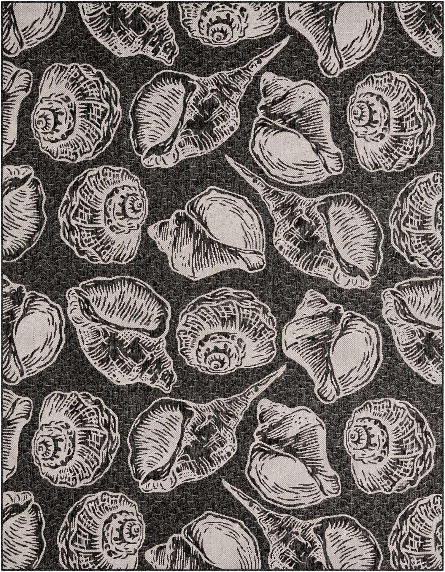 A 9x12 rectangular black and white coastal rug featuring a pattern of various seashells, suitable for indoor or outdoor use.