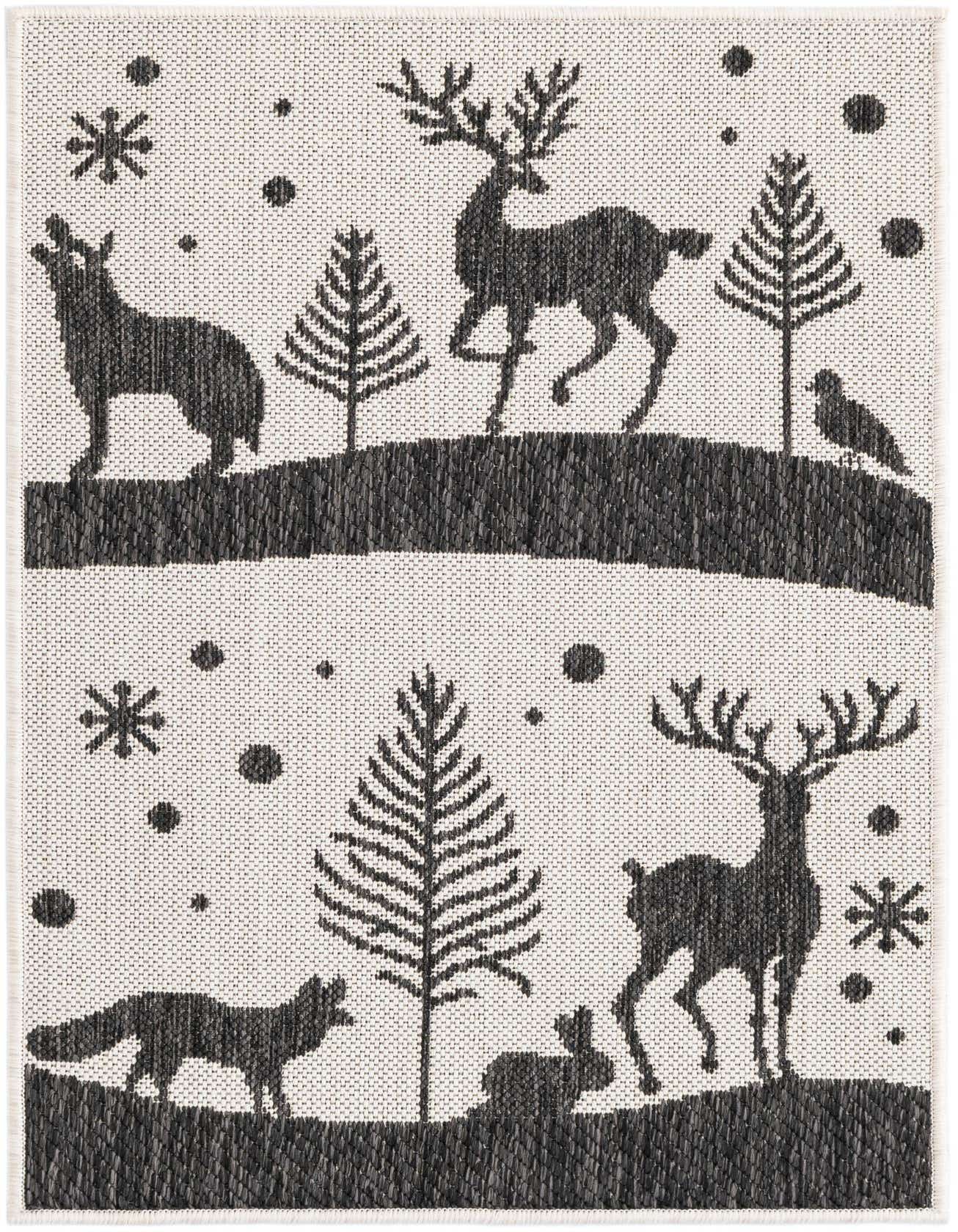 A 2x3 rectangular black and white flatweave rug featuring a modern winter forest scene with deer, fox, wolf, rabbit, bird, trees, and snowflakes.
