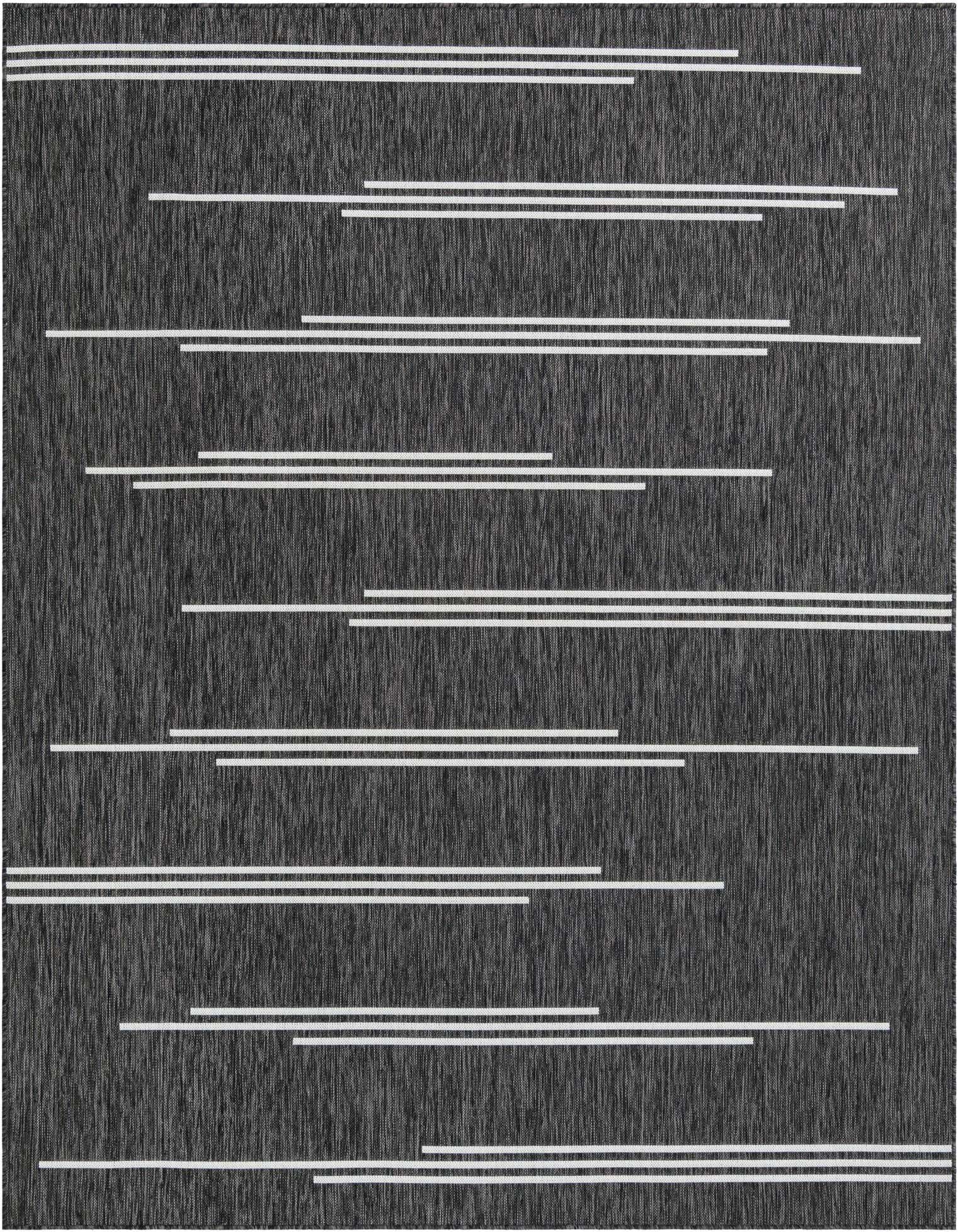 A rectangular 8x10 black and white modern rug with horizontal ivory stripes of varying lengths, suitable for indoor or outdoor use.