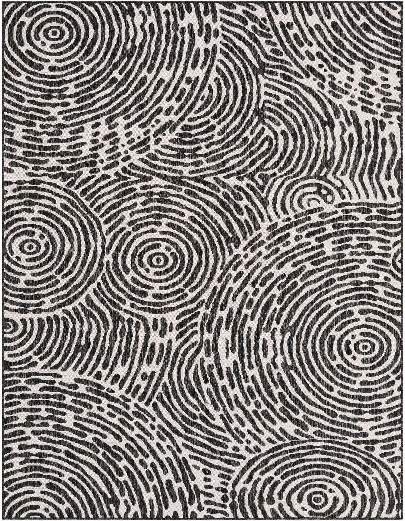 A 6x9 rectangular indoor/outdoor rug featuring a modern abstract pattern of black concentric circles and wavy lines on an ivory background.