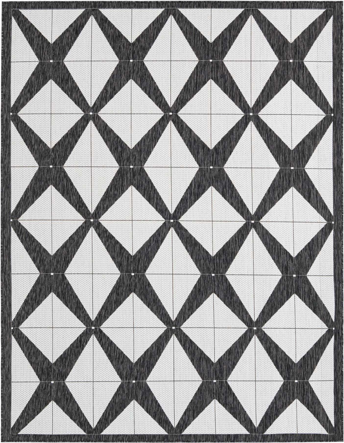 A 7x10 rectangular black and white modern flatweave rug with a bold geometric criss-cross pattern, suitable for indoor or outdoor use.