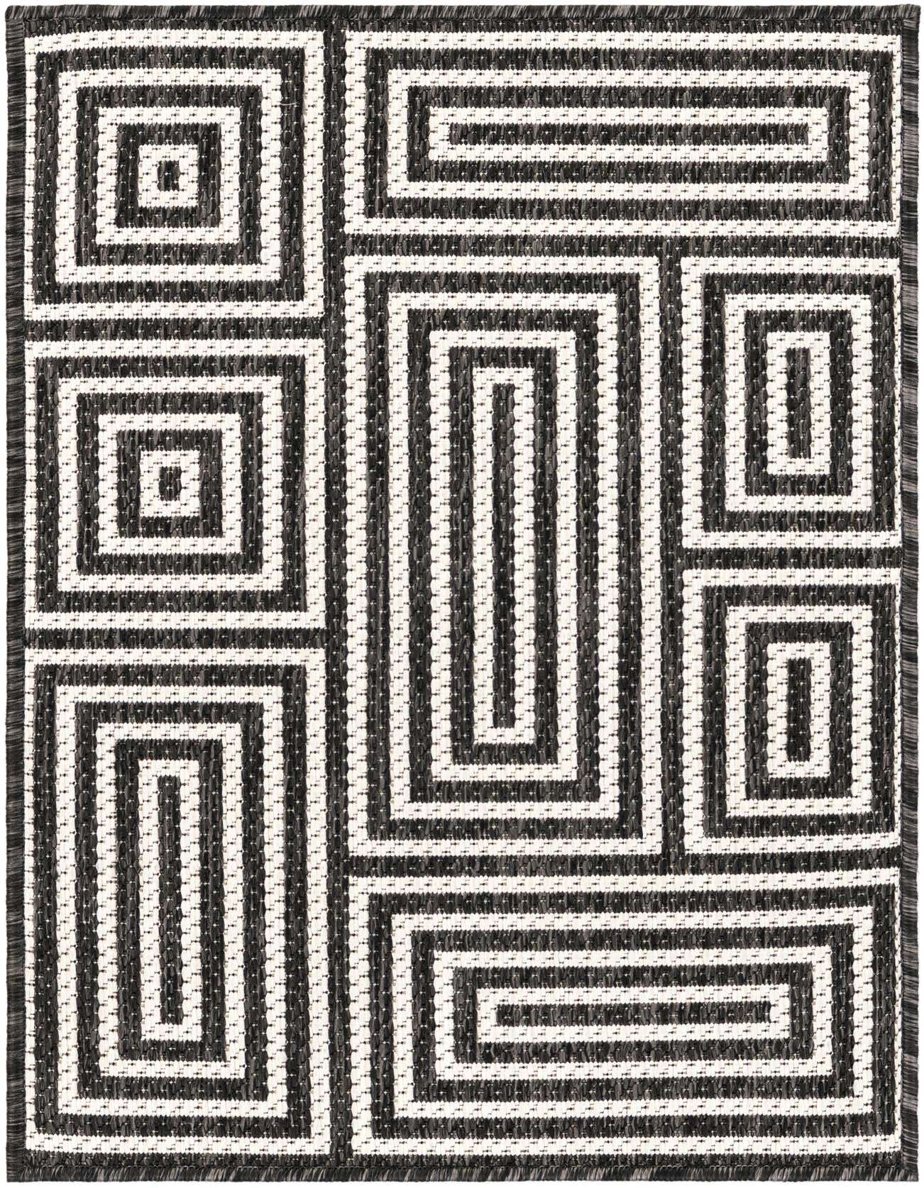 A 2x3 rectangular black and white modern geometric rug with a flatweave texture, suitable for indoor or outdoor use.