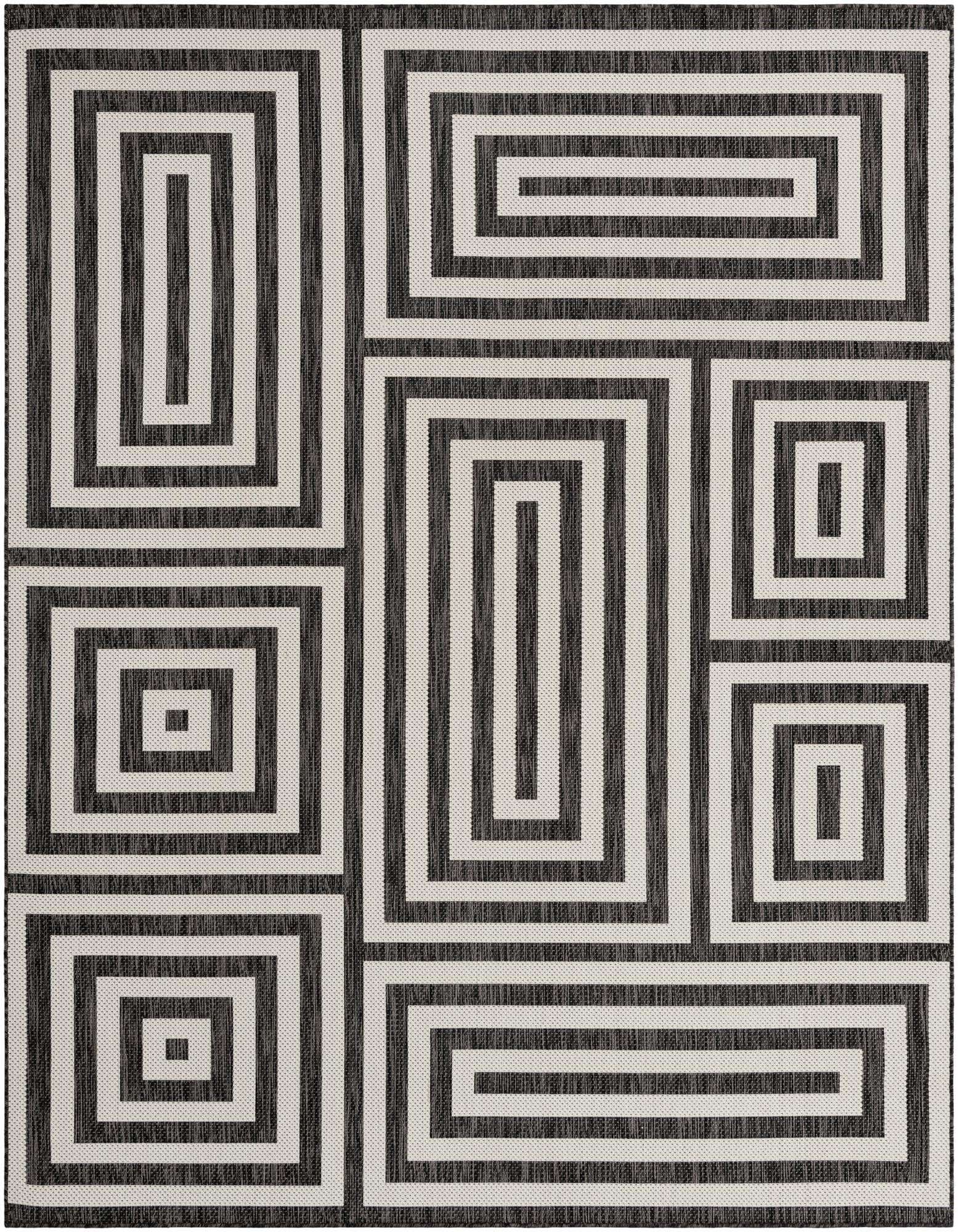 An 8x10 rectangular black and white modern abstract rug with a bold geometric maze pattern, suitable for indoor or outdoor use.
