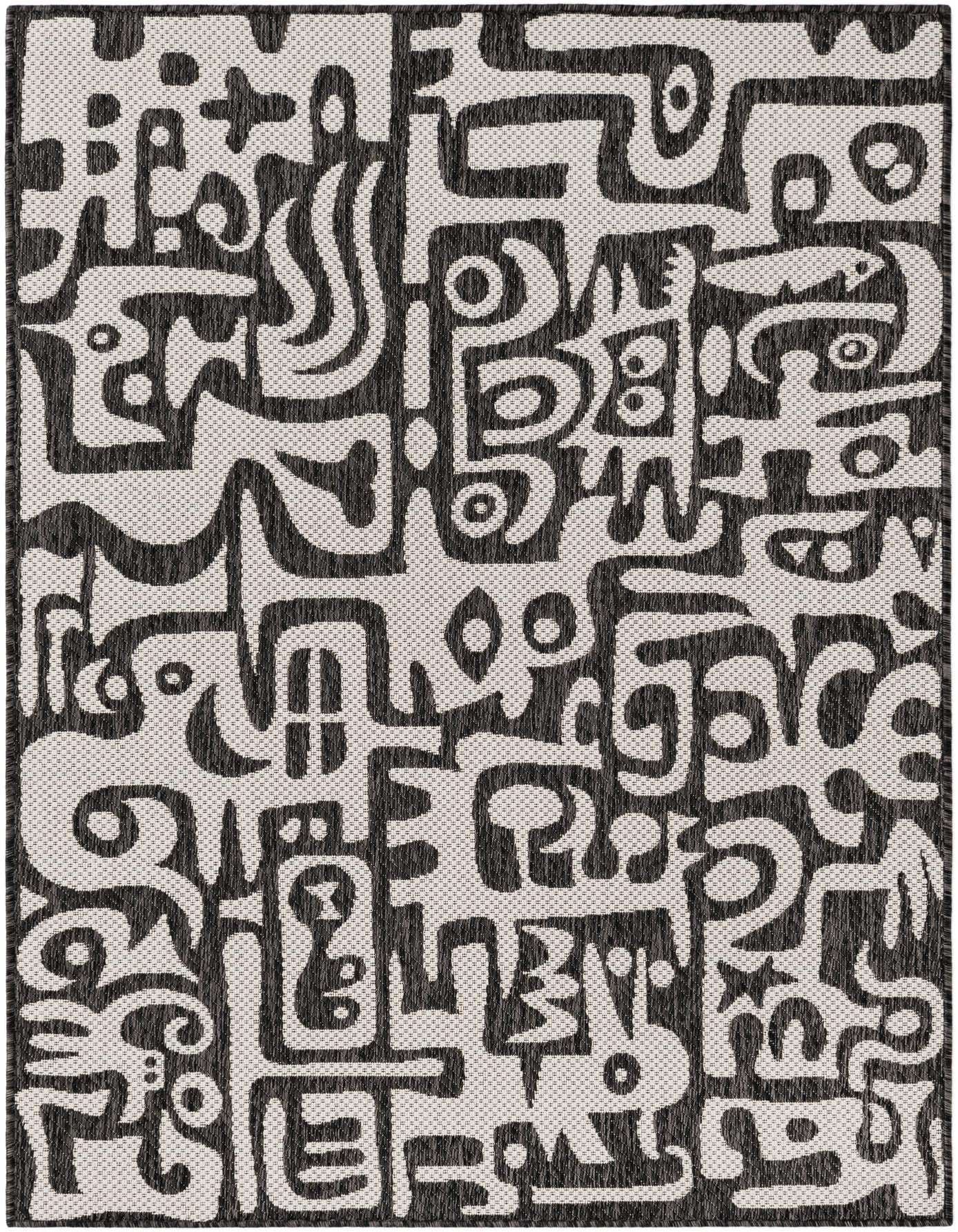 A 4x6 rectangular black and white modern abstract rug with a flatweave texture, suitable for indoor or outdoor use.