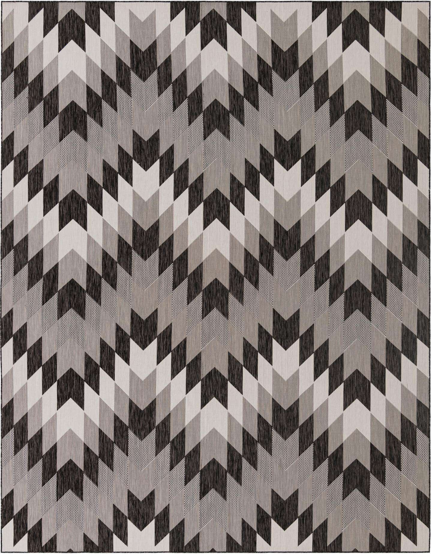 A 10x14 rectangular black, white, and gray geometric tribal rug with a chevron pattern, suitable for indoor or outdoor use.