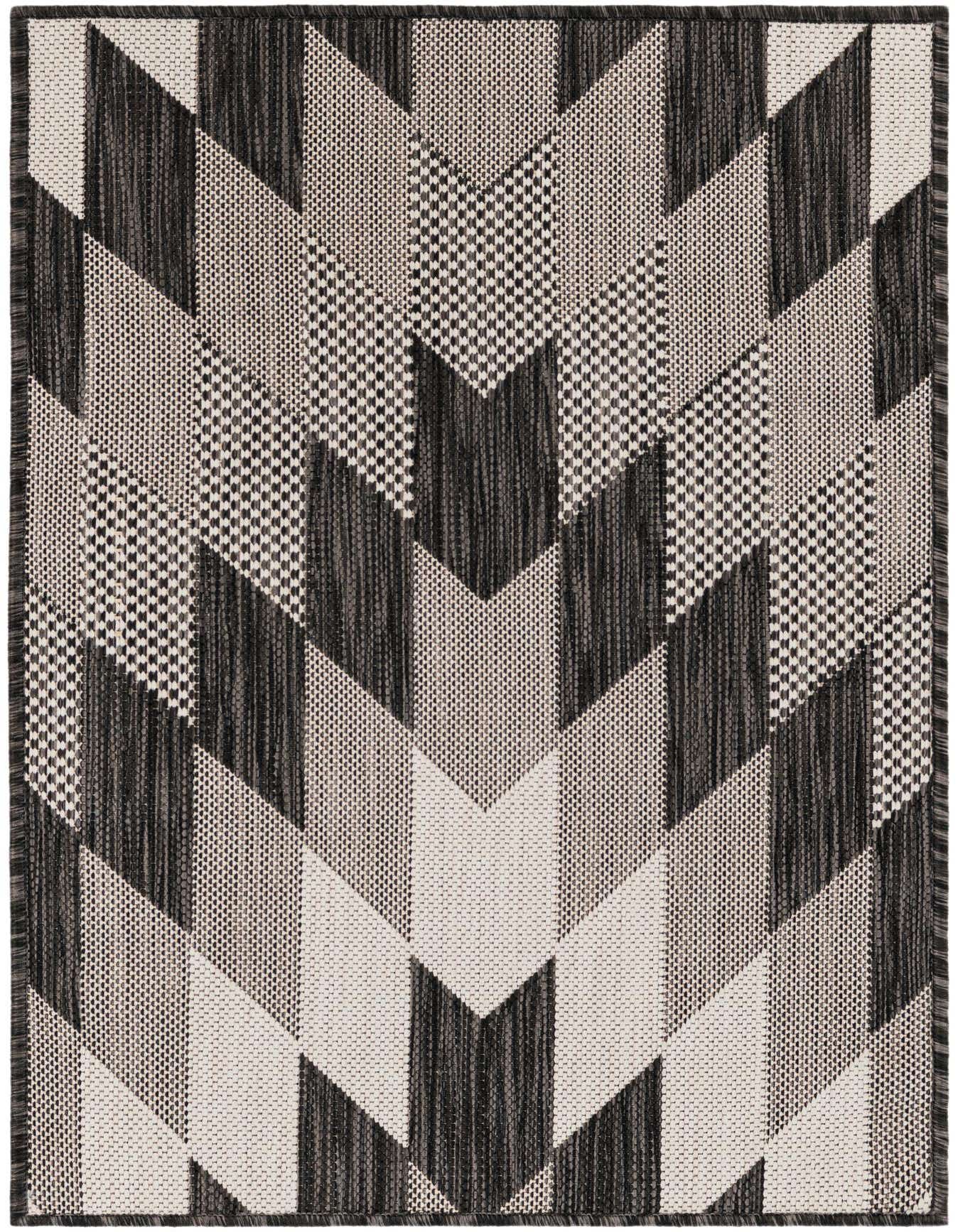 A 2x3 rectangular black and white flatweave rug with a modern tribal geometric pattern, suitable for indoor or outdoor use.