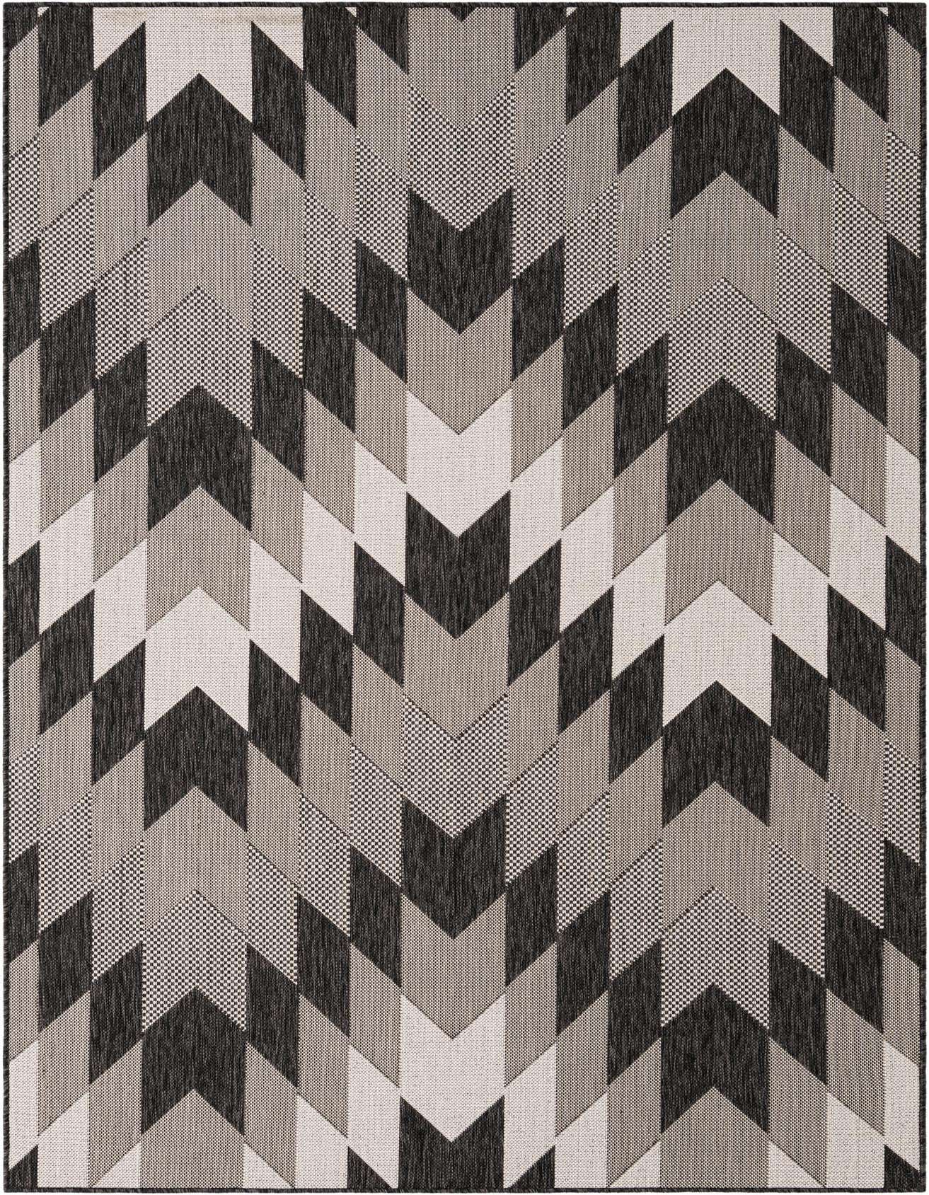 A 5x8 rectangular indoor/outdoor rug featuring a modern tribal pattern in black, ivory, and grey chevron and diamond shapes.