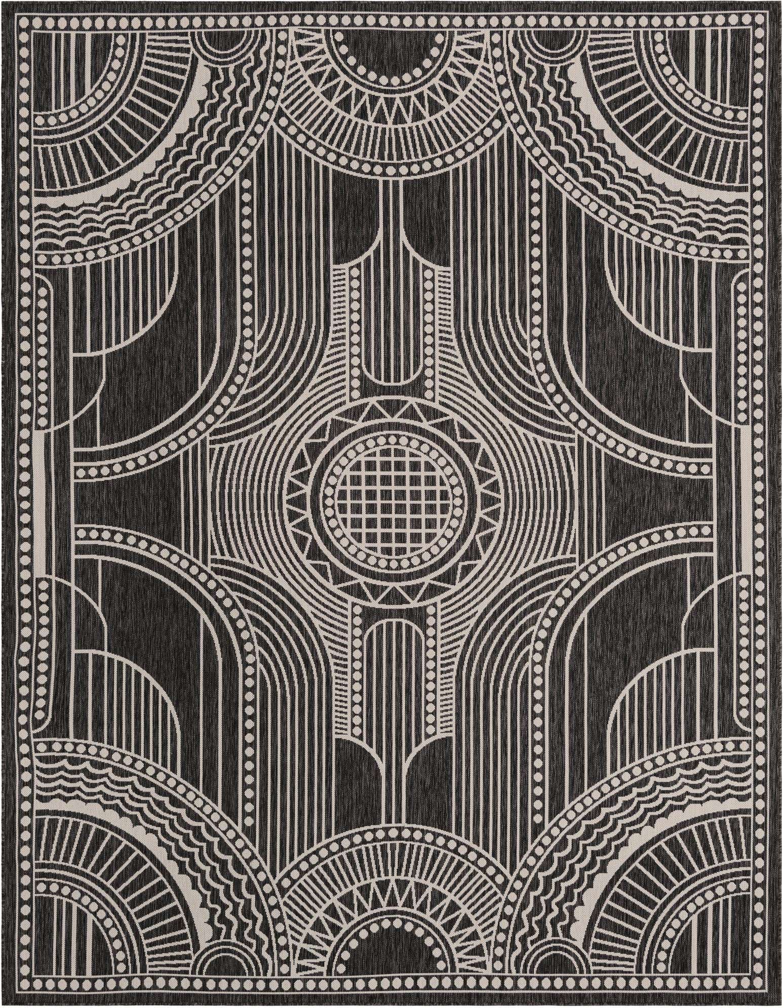 A 9x12 rectangular black and white rug featuring a bold contemporary medallion pattern with intricate geometric lines and dots.