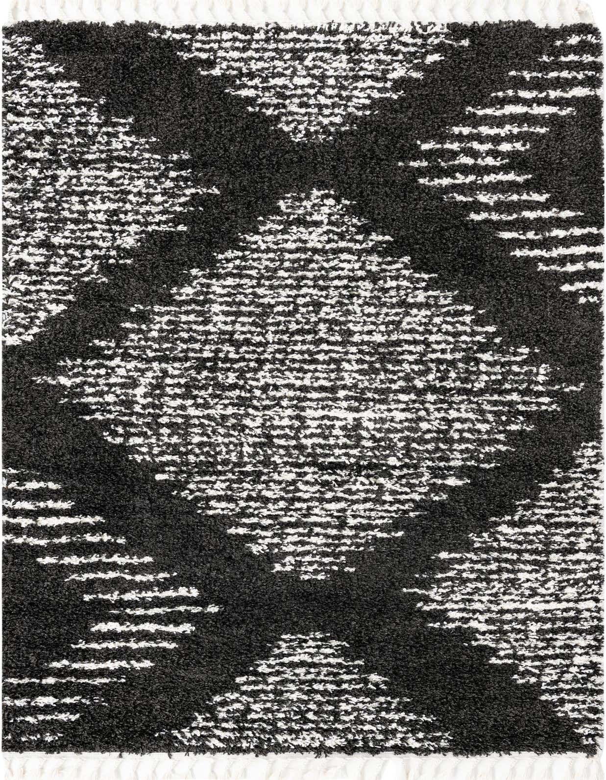A 5x8 rectangular black and white shag rug featuring a modern trellis pattern, suitable for a living room.