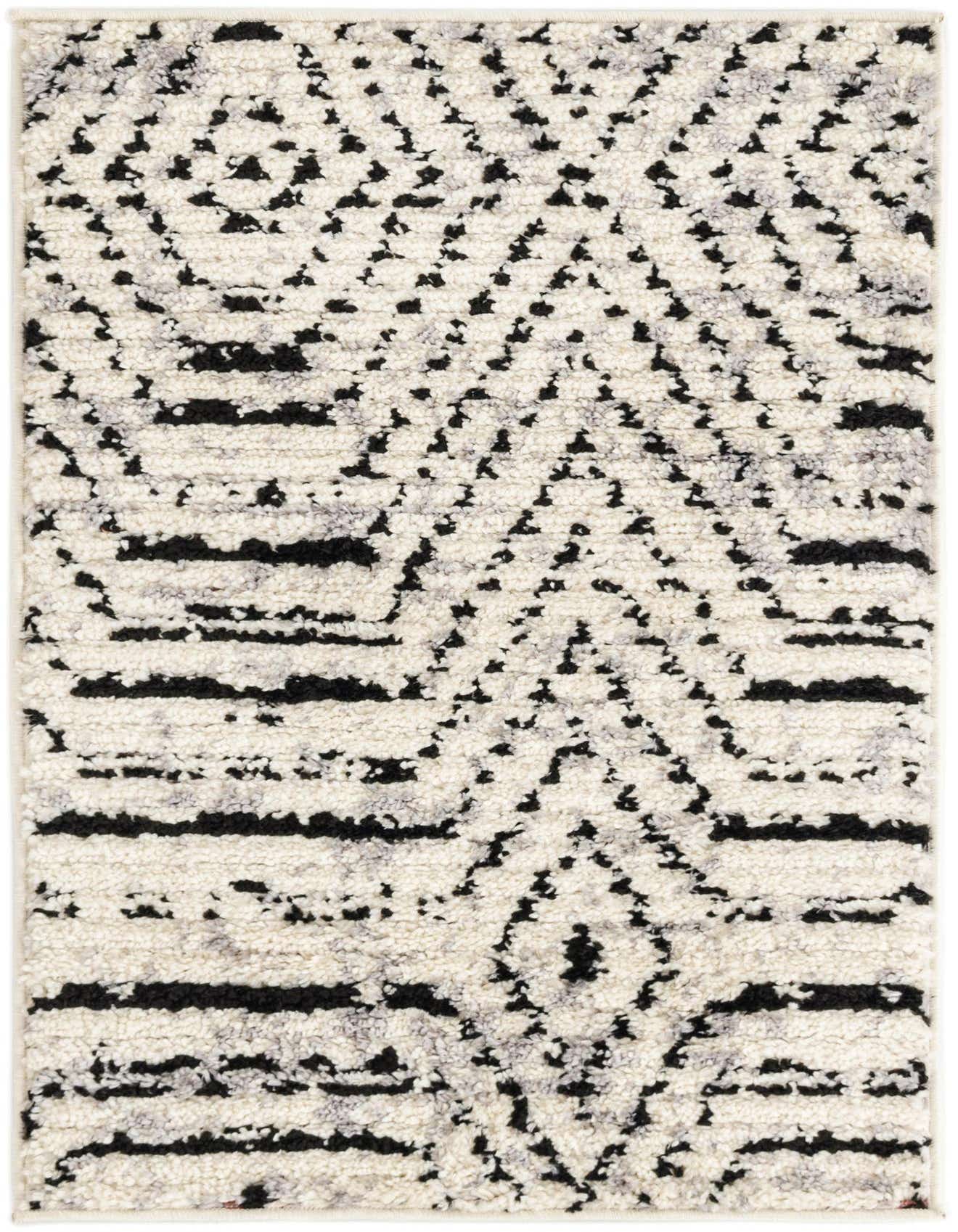 A 2x3 rectangular Tagine rug featuring a modern black and white striped pattern with textured pile.