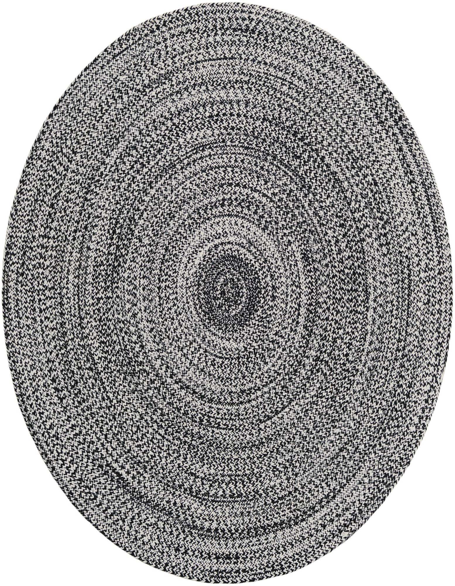 A 5' 3 round black and white braided rug with a subtle striped pattern, suitable for indoor or outdoor use.