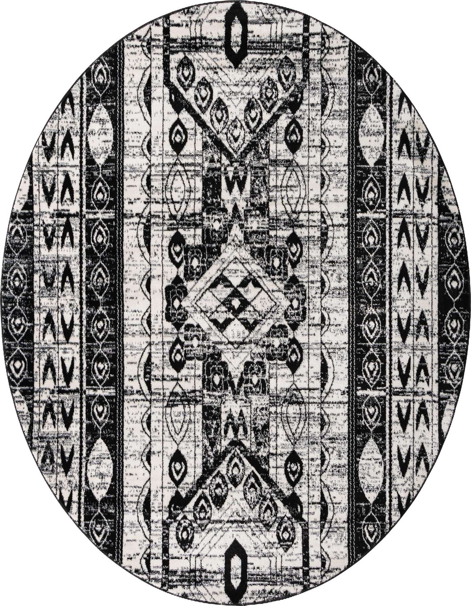 A round 7' black and white bohemian rug with tribal and Southwestern patterns, featuring stripes and geometric shapes.