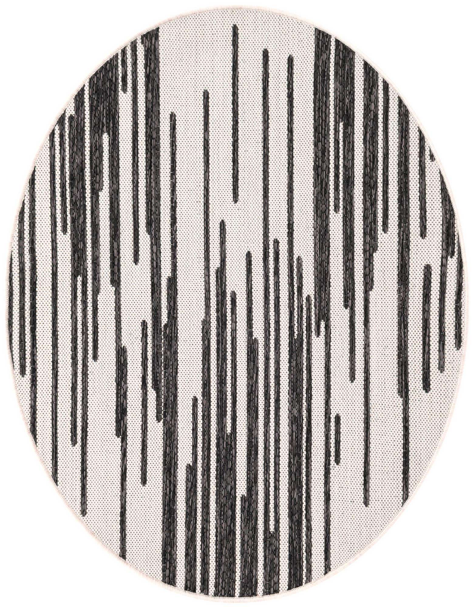 A 3' round black and white modern flatweave rug with a vertical stripe pattern, suitable for indoor or outdoor use.
