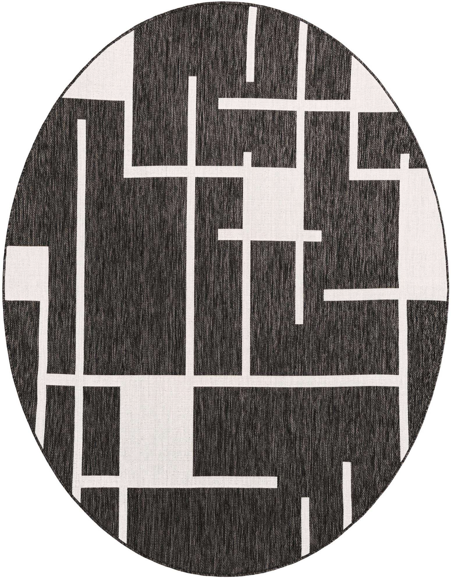 A 7'10" round black and white modern geometric rug, suitable for indoor or outdoor use on a patio.