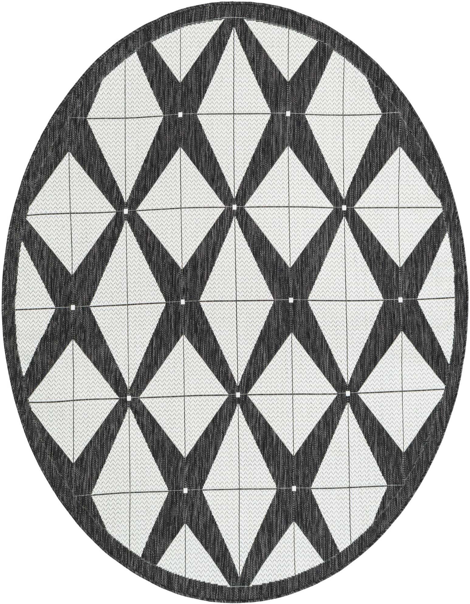 A 6-foot round black and white modern geometric rug with a bold diamond pattern, suitable for indoor or outdoor use.