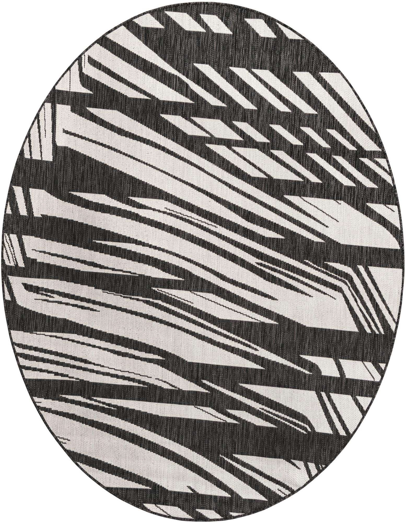 A round 6'1" black and white modern flatweave rug with abstract geometric stripes, suitable for indoor or outdoor use.
