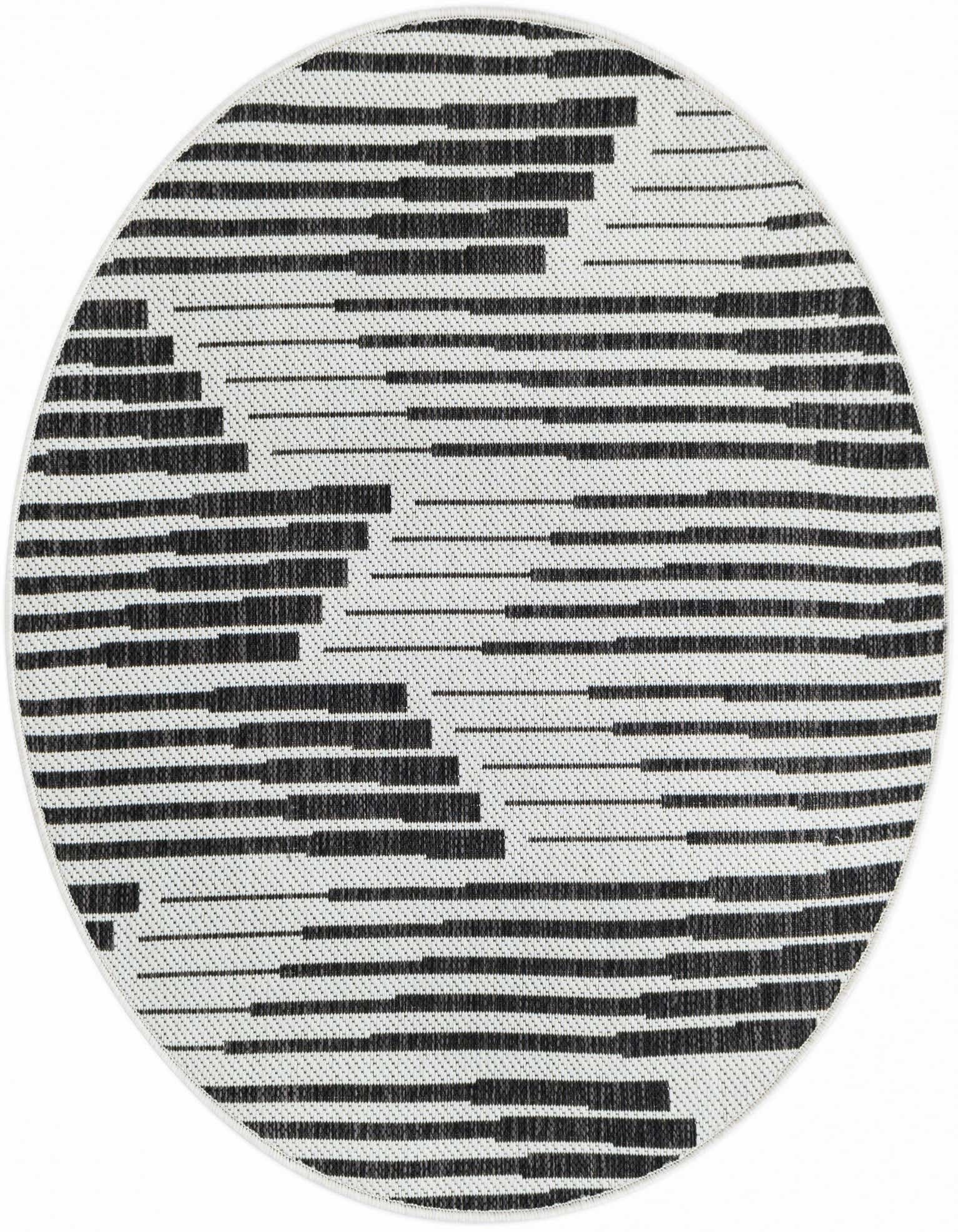 A 3' round black and white contemporary outdoor rug with a modern striped pattern, ideal for a patio.