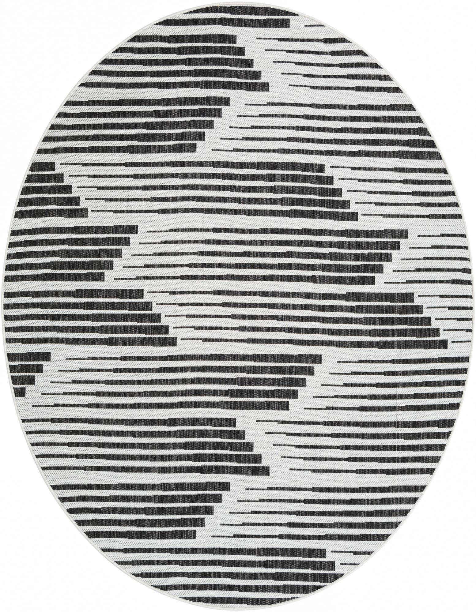 A round 7' 10" black and white outdoor rug featuring a modern, striped geometric pattern with varying line lengths.