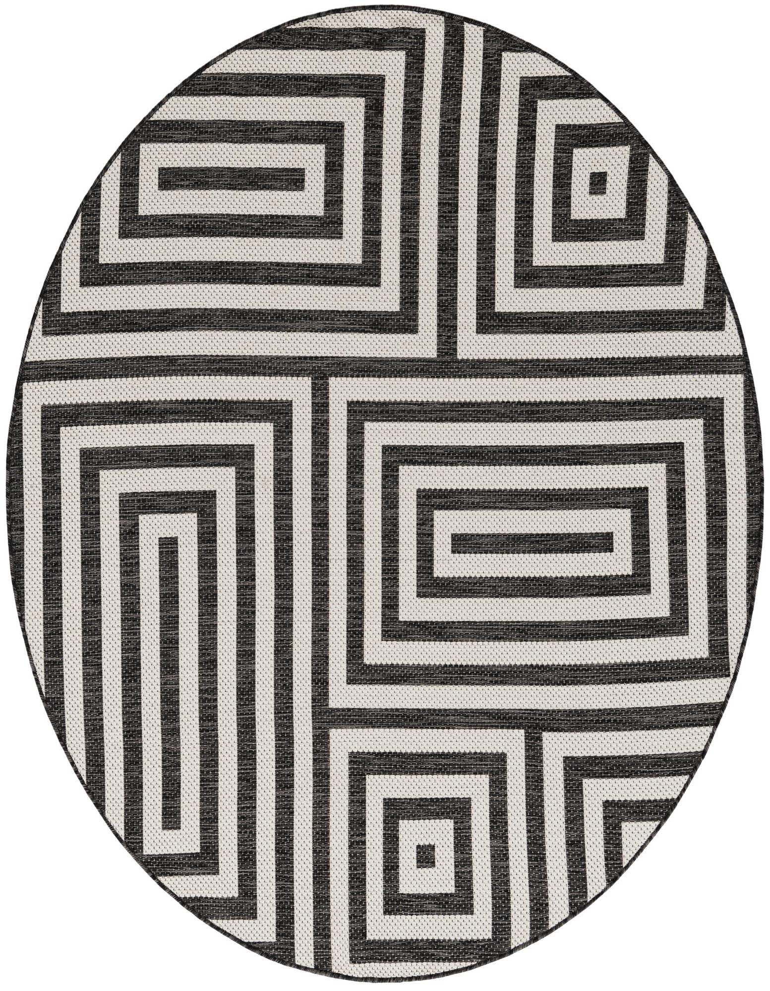 A 6' round black and white modern geometric rug with a bold maze-like pattern, suitable for indoor or outdoor use.