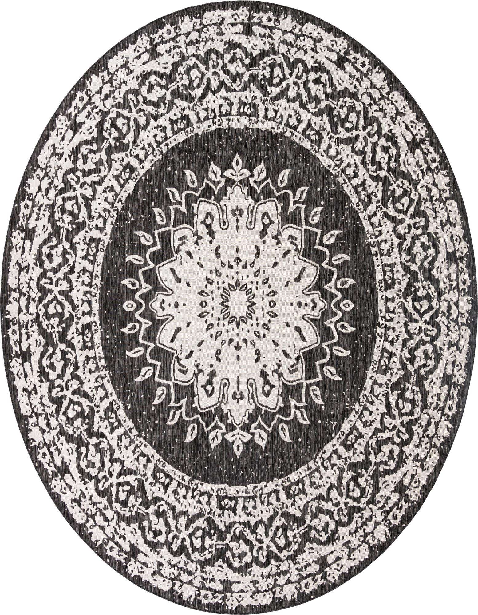 A 12-foot round black and white medallion rug with a distressed traditional pattern, suitable for indoor or outdoor use.