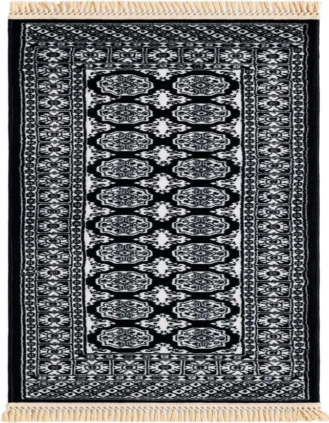 A 6 ft runner rug from the Bokhara collection, featuring a black and white traditional pattern with fringe.