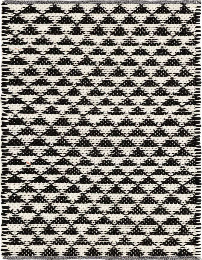 A 6 ft runner rug featuring a black and white geometric diamond pattern, made from textured cotton and jute.