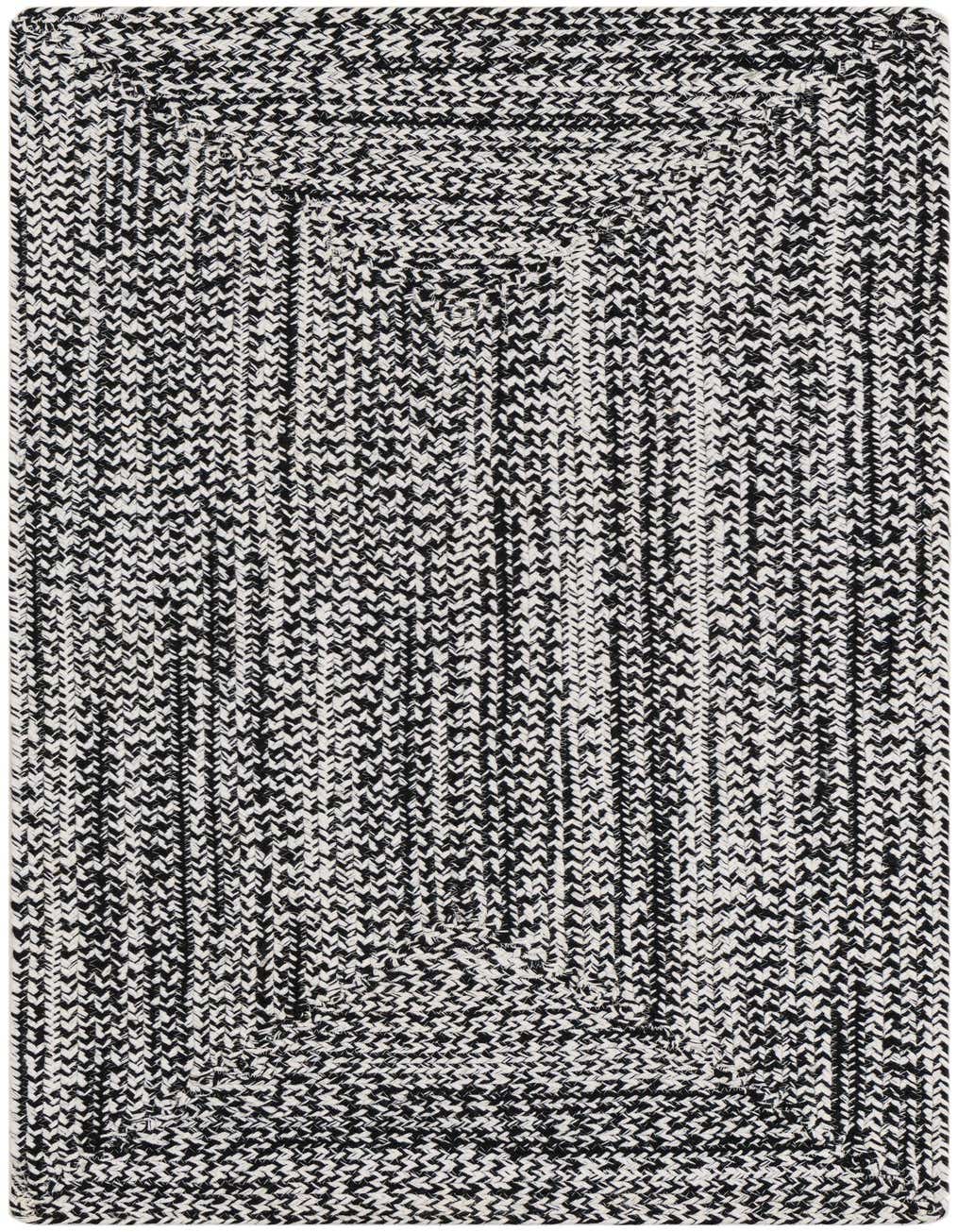 A 4 ft black and white braided runner rug with a modern stripe pattern, suitable for a hallway or patio.
