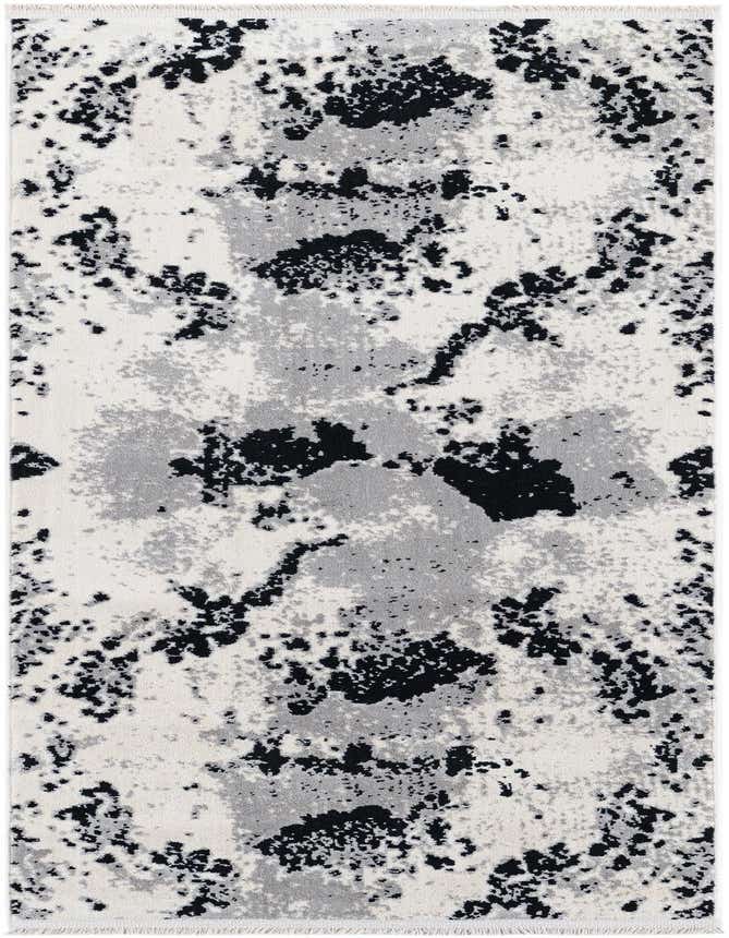 A 6 ft runner rug with an abstract modern pattern in black, white, and gray, ideal for a hallway or kitchen.