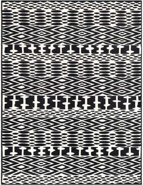 A black and white runner rug with a bold geometric pattern, featuring alternating bands of diamonds, circles, and abstract shapes, ideal for a hallway.