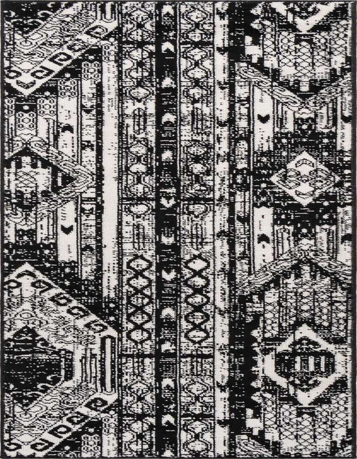 A 6 ft runner rug featuring a distressed black and white bohemian tribal pattern, ideal for a hallway.
